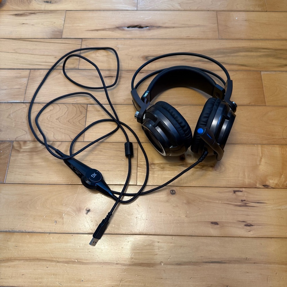 Black xg gaming headphones with Wired Connection